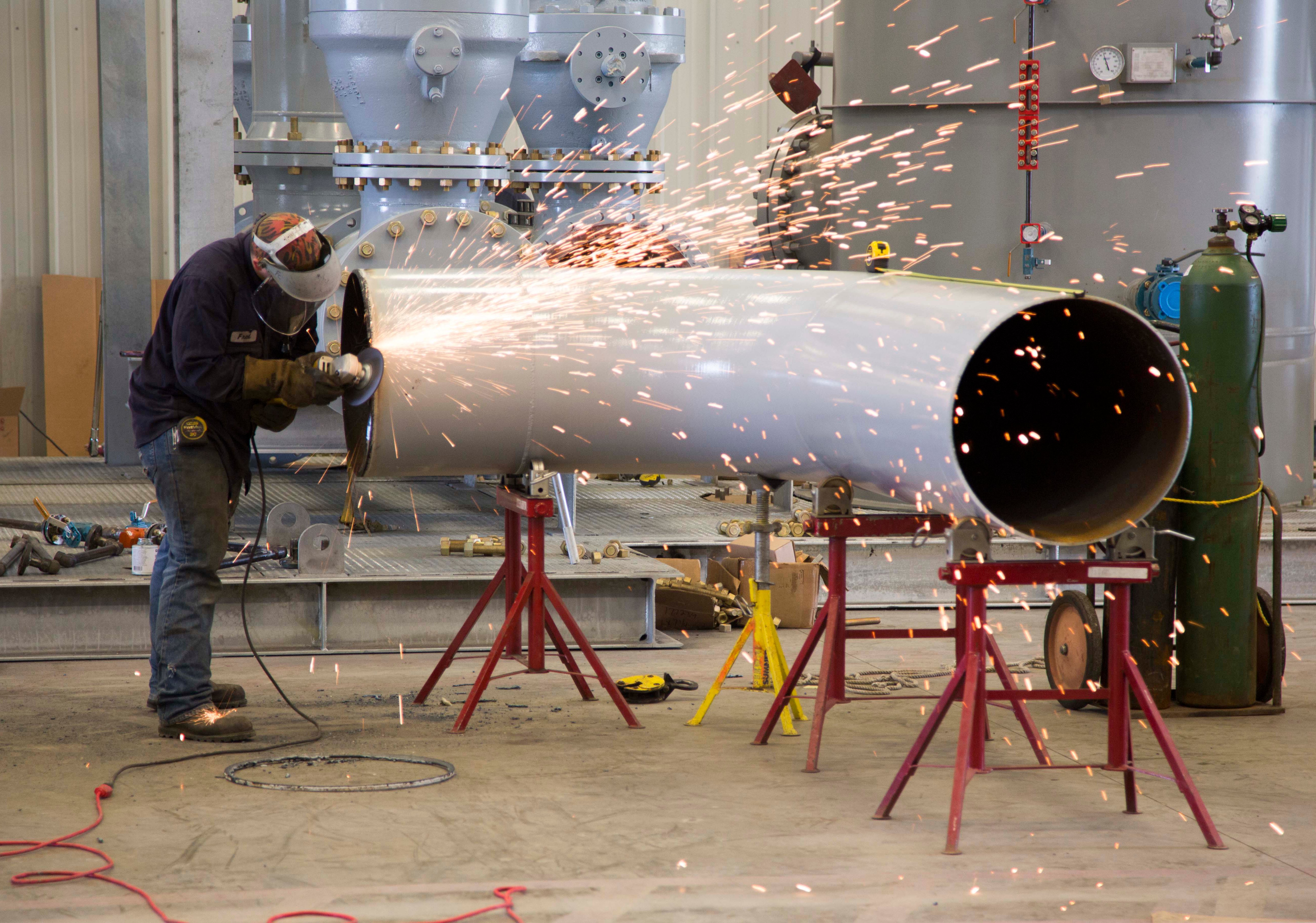 bolt-employee-assembling-piping